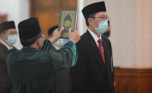 Busrul Iman Disahkan Sebagai Direktur Utama Bank Jatim