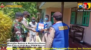 Bantu Warga Terdampak Covid-19, Polisi di Bawean Bagikan 200 Paket Beras Kepada Warga