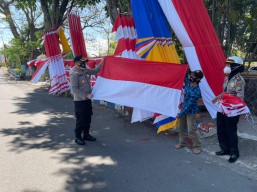 2500 Bendera Merah Putih untuk “Gerakan Serentak Polres Nganjuk Untuk Indonesia Tangguh, Indonesia Tumbuh”
