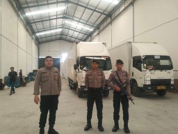 Polres Gresik Kawal Distribusi Surat Suara Pemilu dari PPK ke Gudang KPU Kabupaten