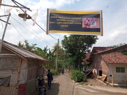 Viral Warga Jember Pasang Banner "Daerah Rawan Tuyul", Uang Rp 200-300 Ribu Sering Hilang