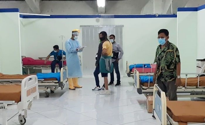 Pulang dari Malaysia dan Singapura, 11 Pekerja Migran Asal Gresik Langsung Dikarantina di Stadion Gejos